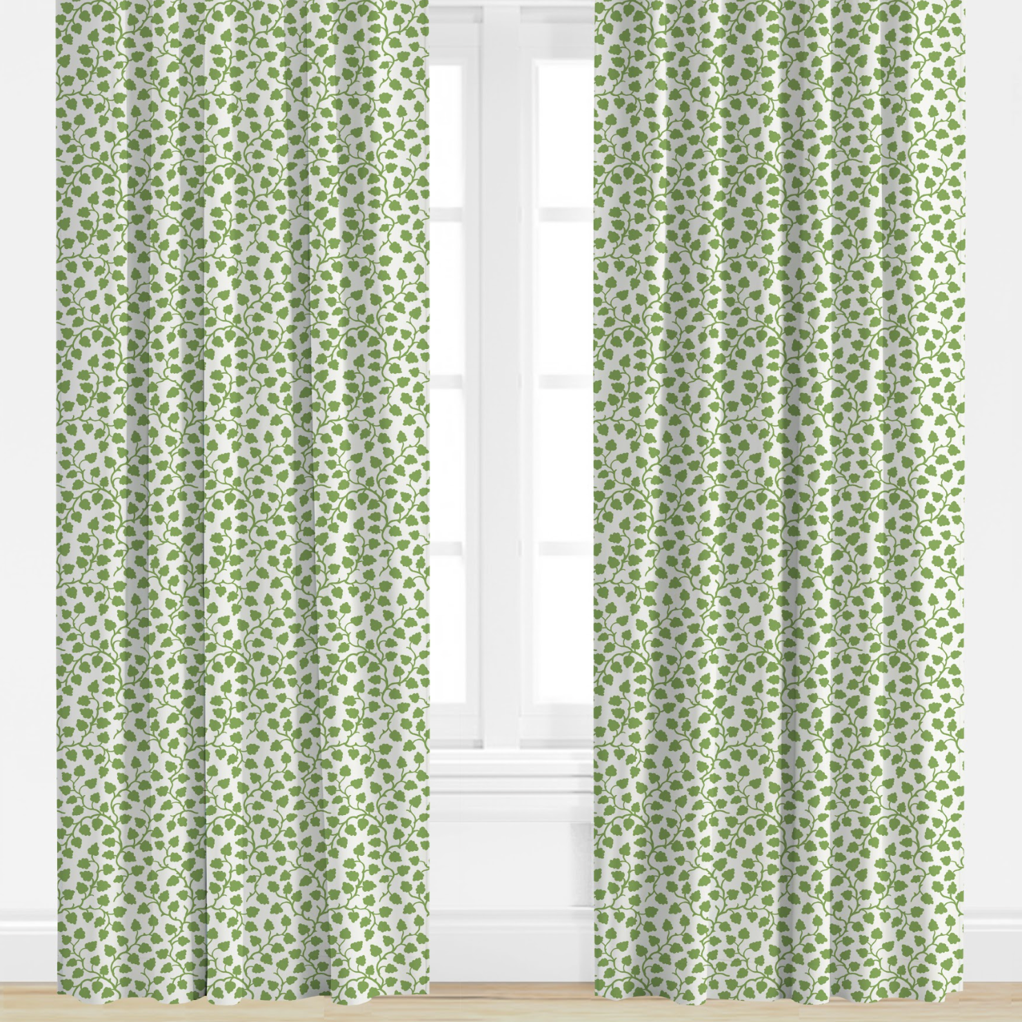 Green patterned curtains on a white window with a light background