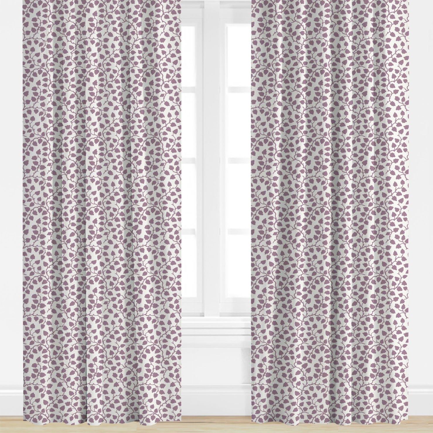 Pair of purple patterned curtains on a window with a white background