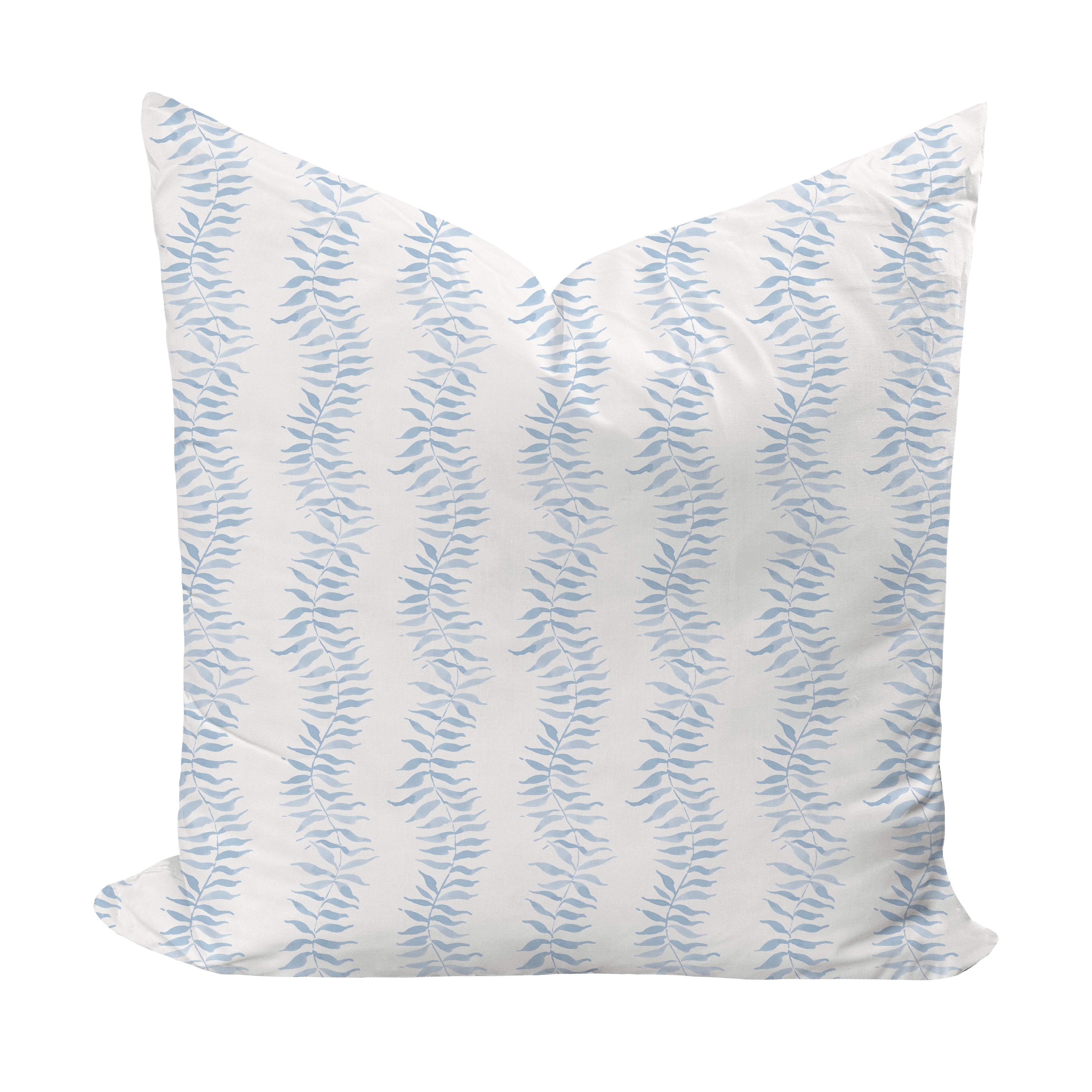 Decorative pillow with blue leaf pattern on a white background