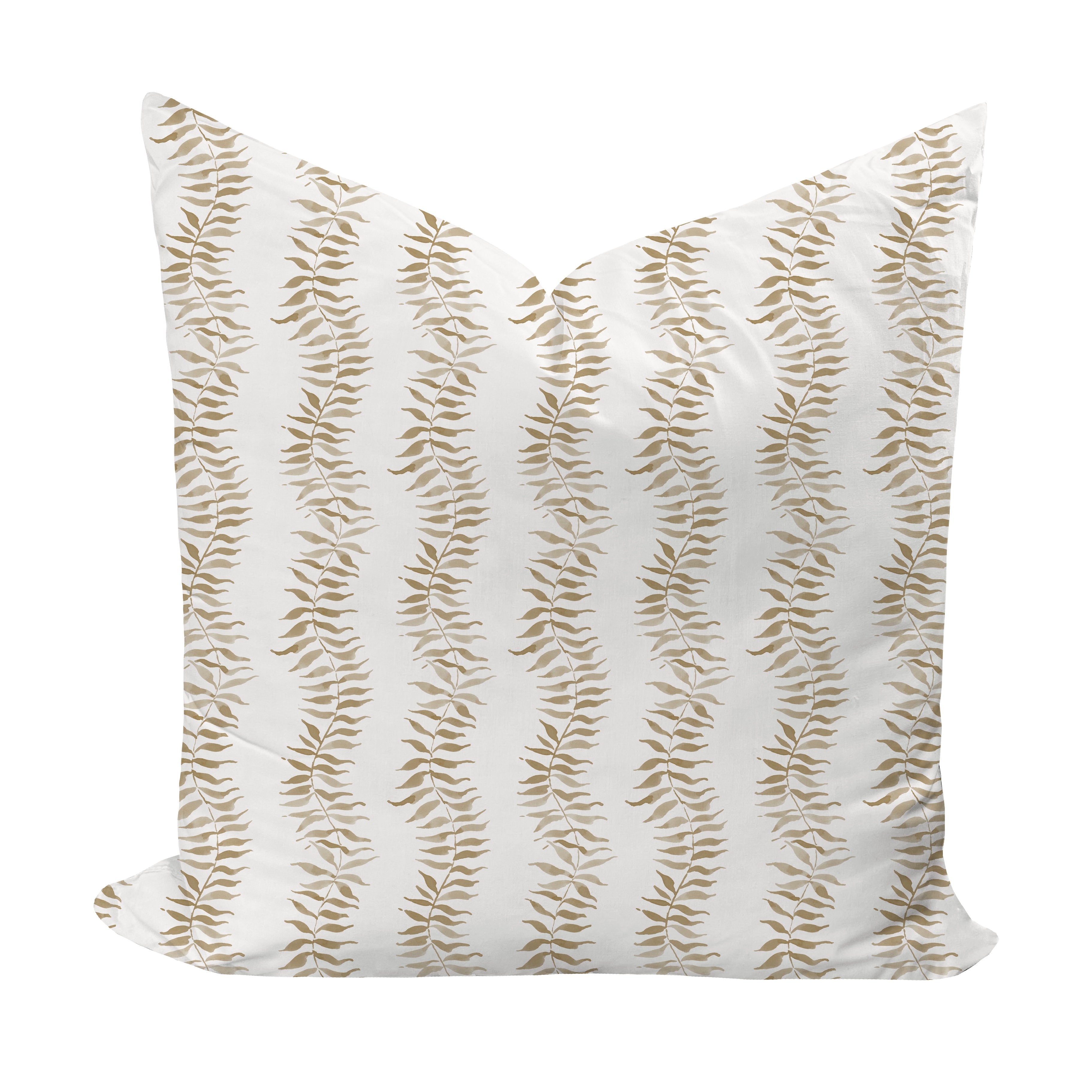 Decorative pillow with tan leaf pattern on a white background