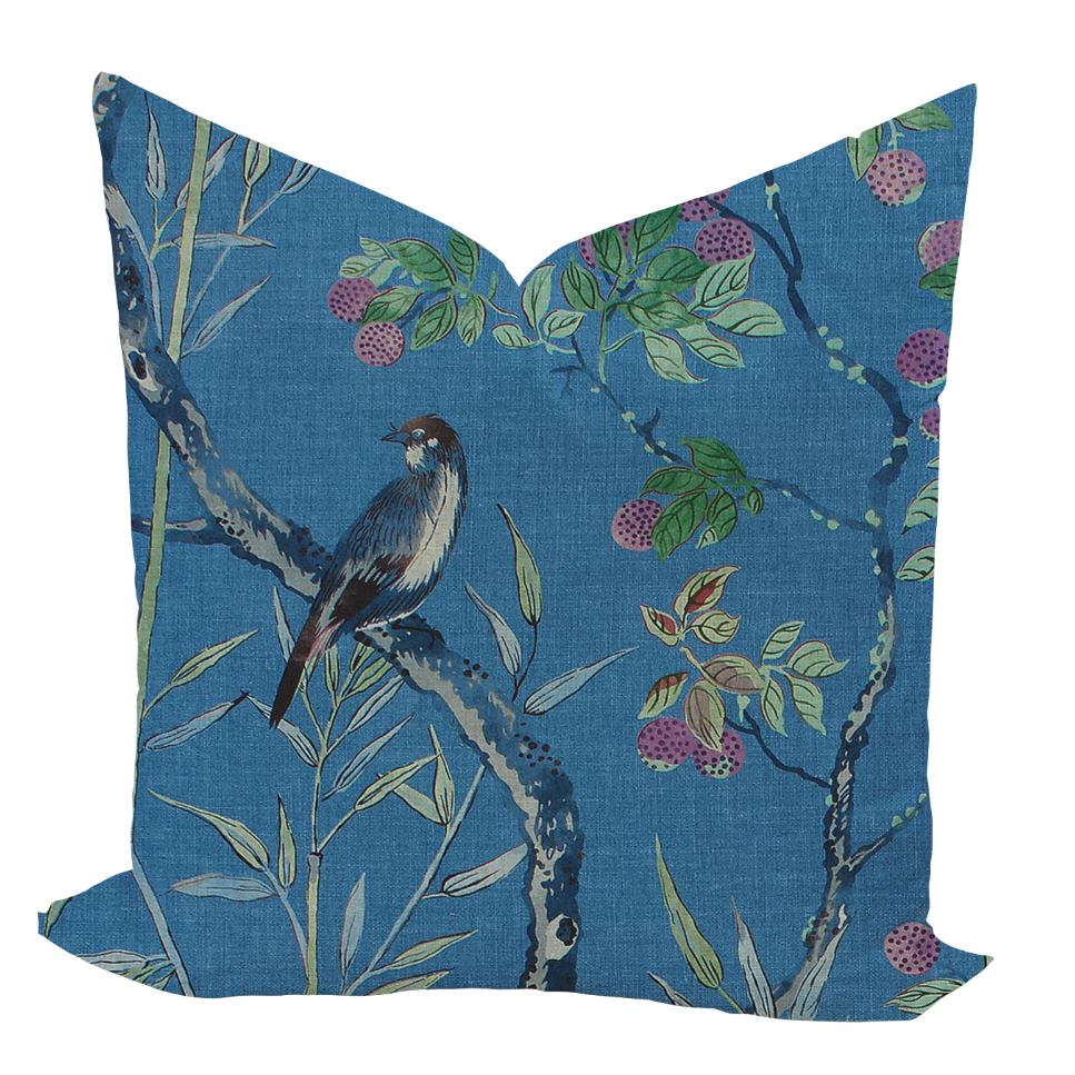 A navy blue cushion cover with a floral and animal pattern, featuring a bird perched on a branch amidst lychee fruit and delicate leaves.