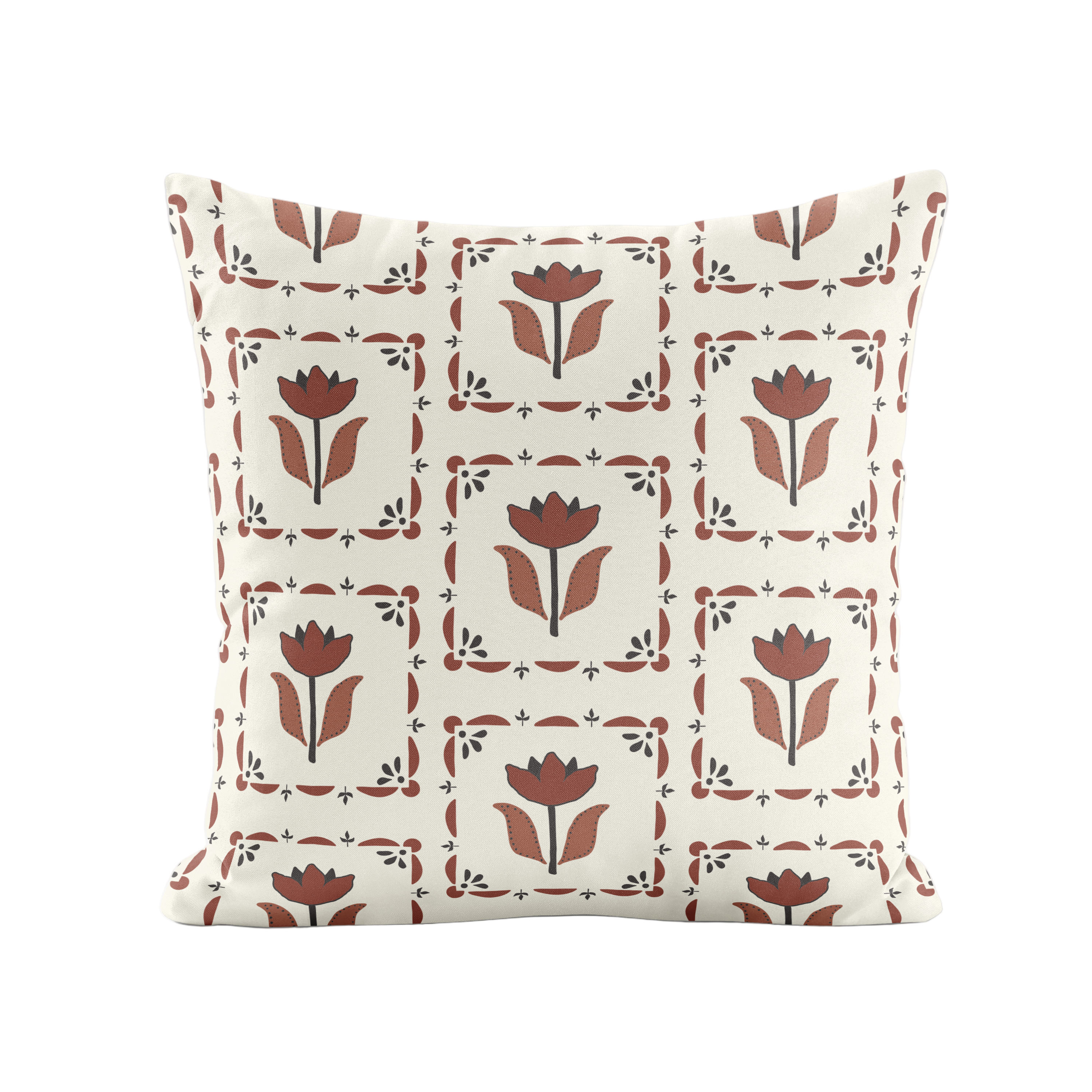 Decorative pillow with black and brown floral pattern on a plain background