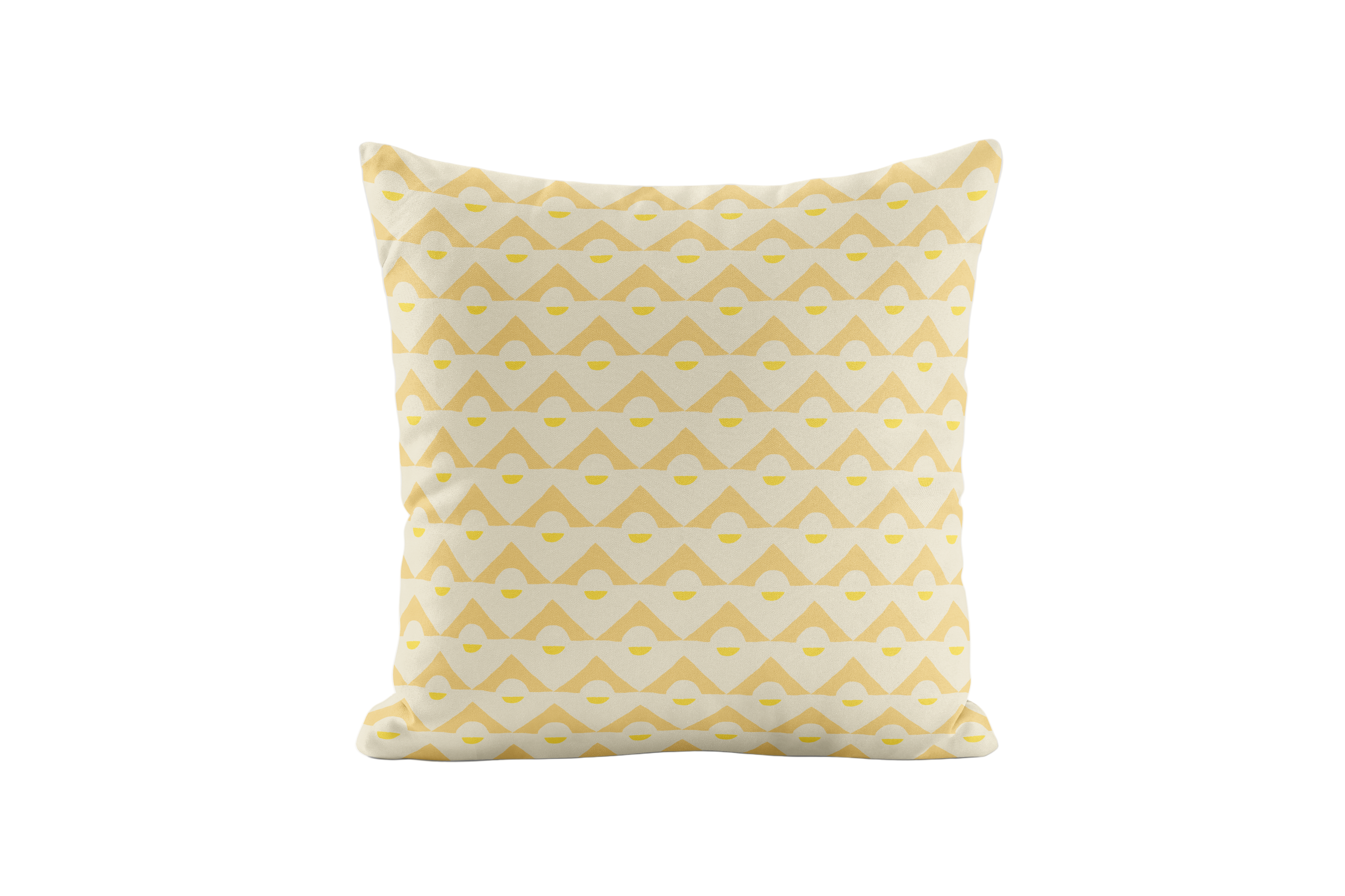 Yellow geometric patterned pillow on a light gray background