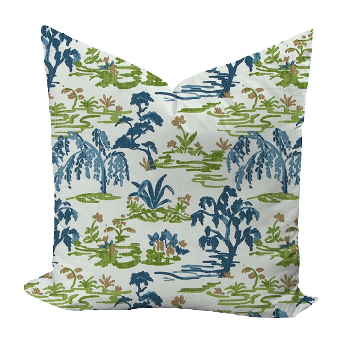 Pillow cover featuring trees and grasslands in blue and green