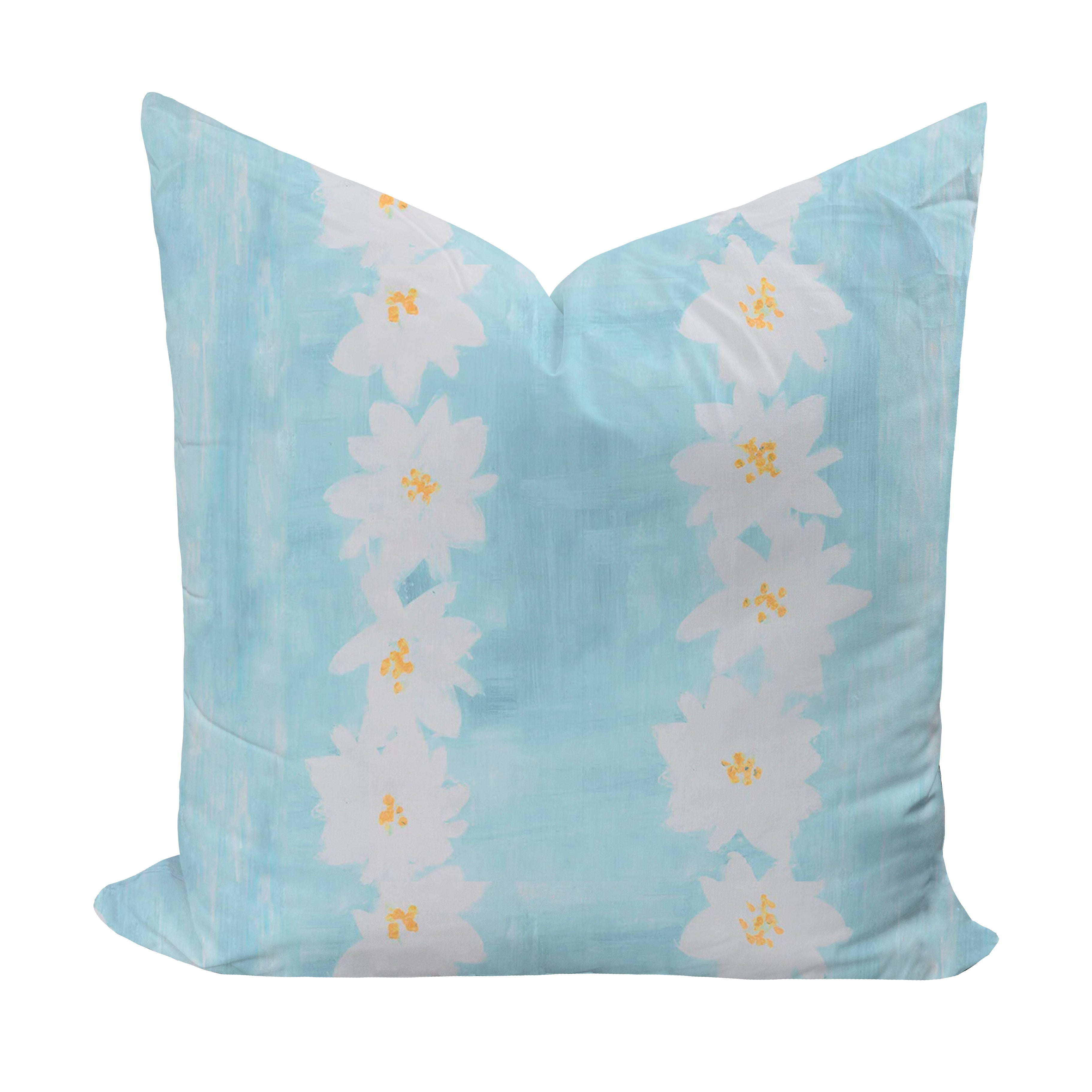 Decorative pillow with daisy pattern on a light blue background