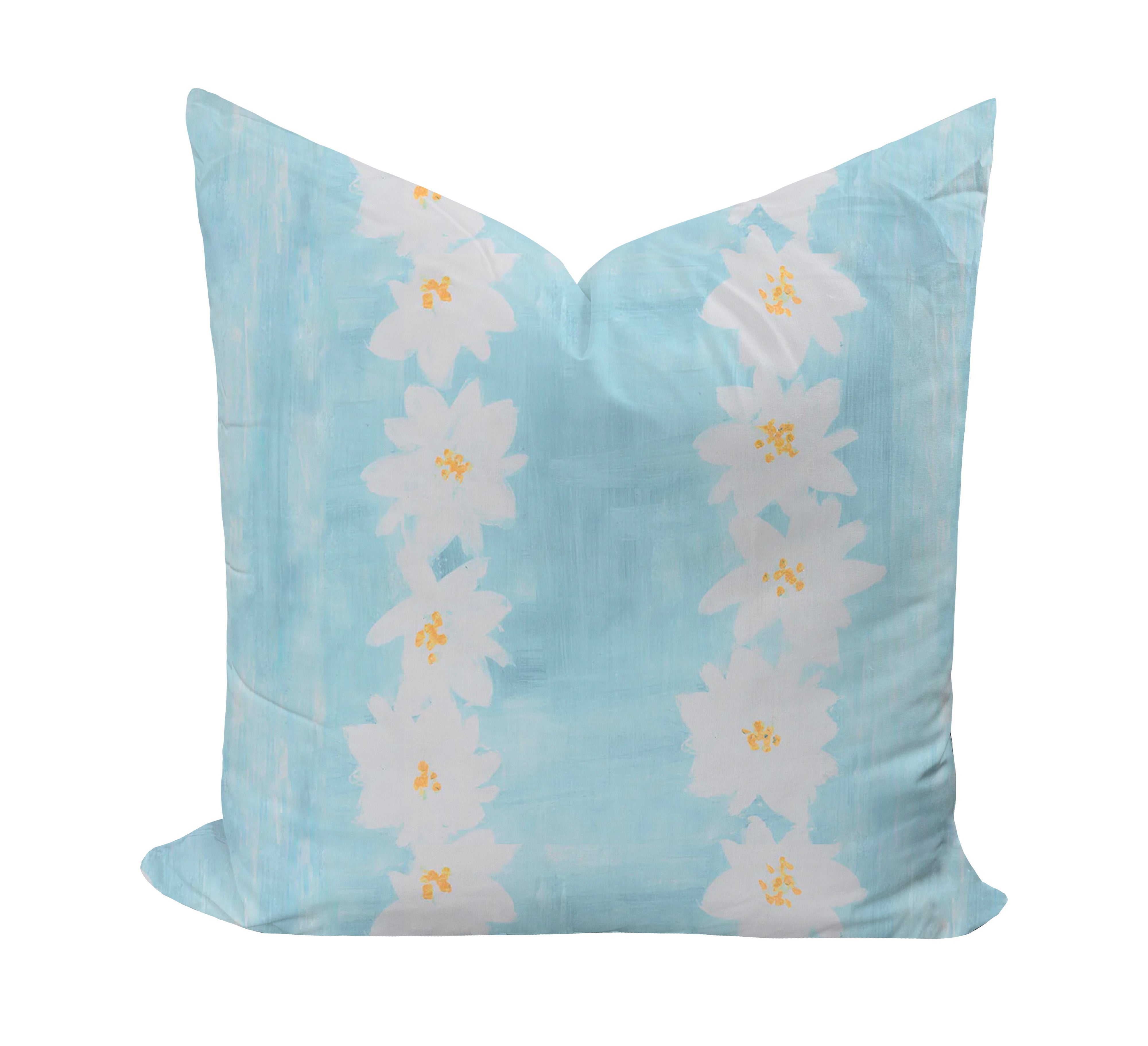Decorative pillow with daisy pattern on a light blue background