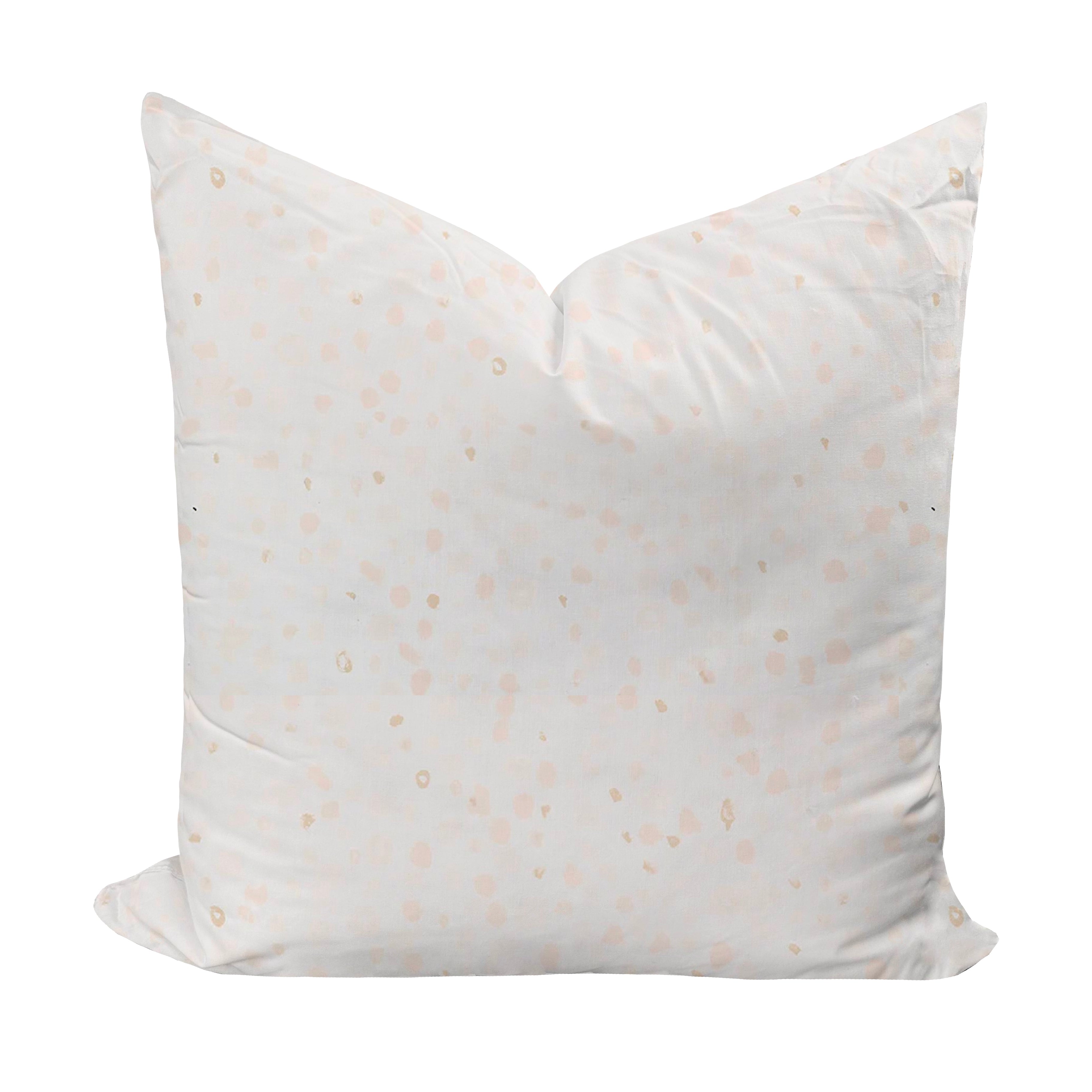 dotted throw pillow in neutral color