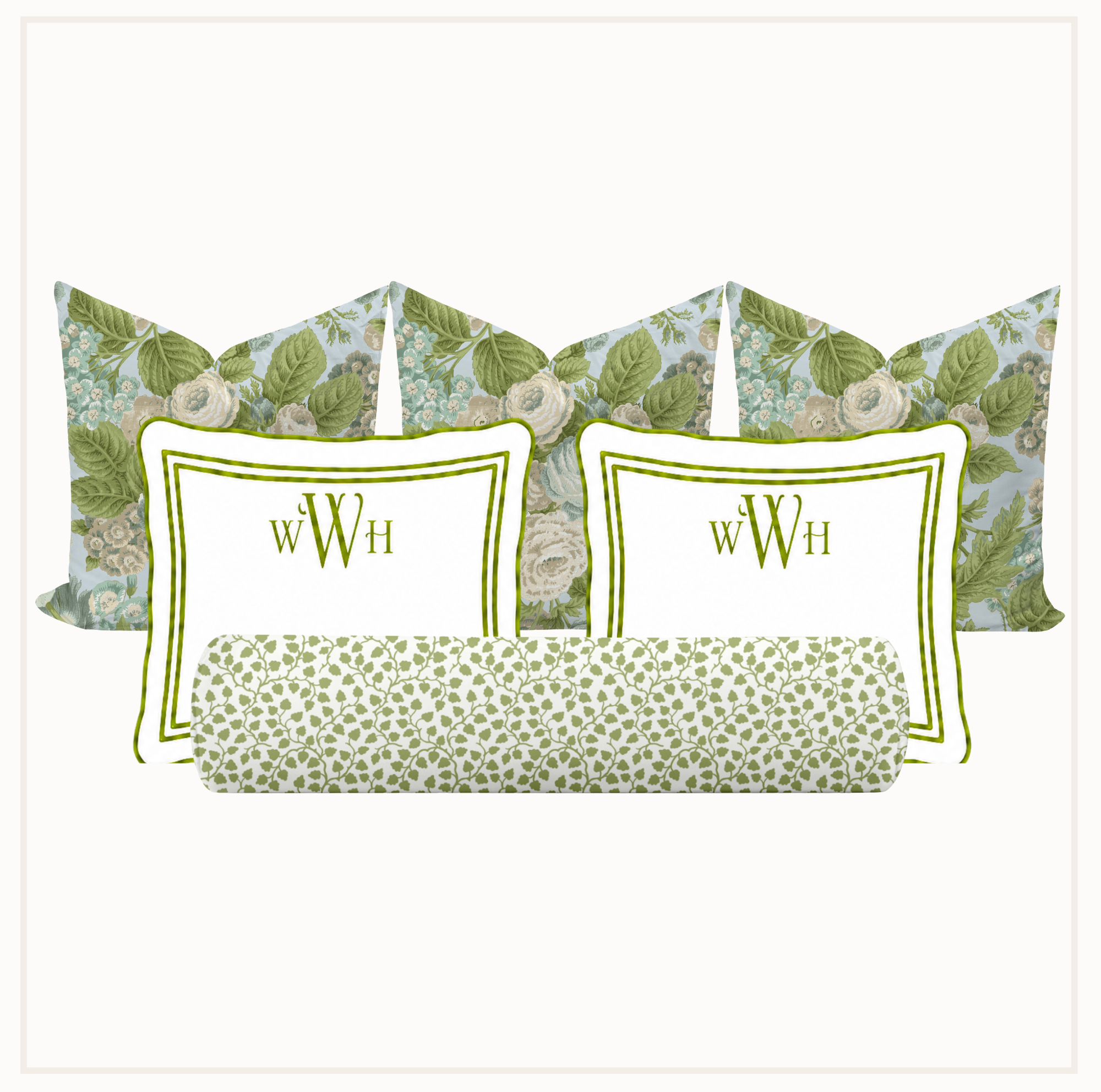 Set of decorative pillows with floral patterns and monograms on a white background