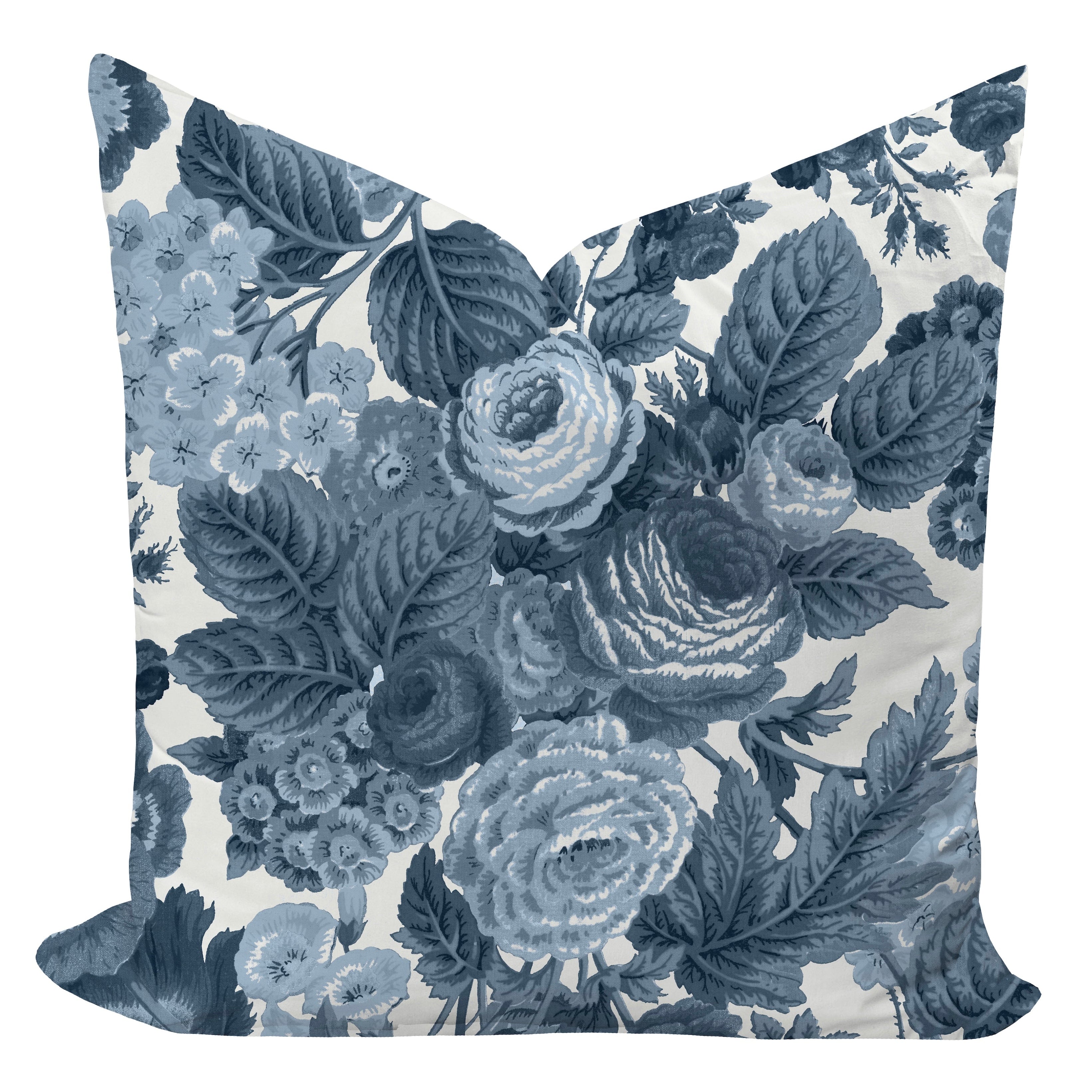 Floral patterned pillow with blue flowers on a white background