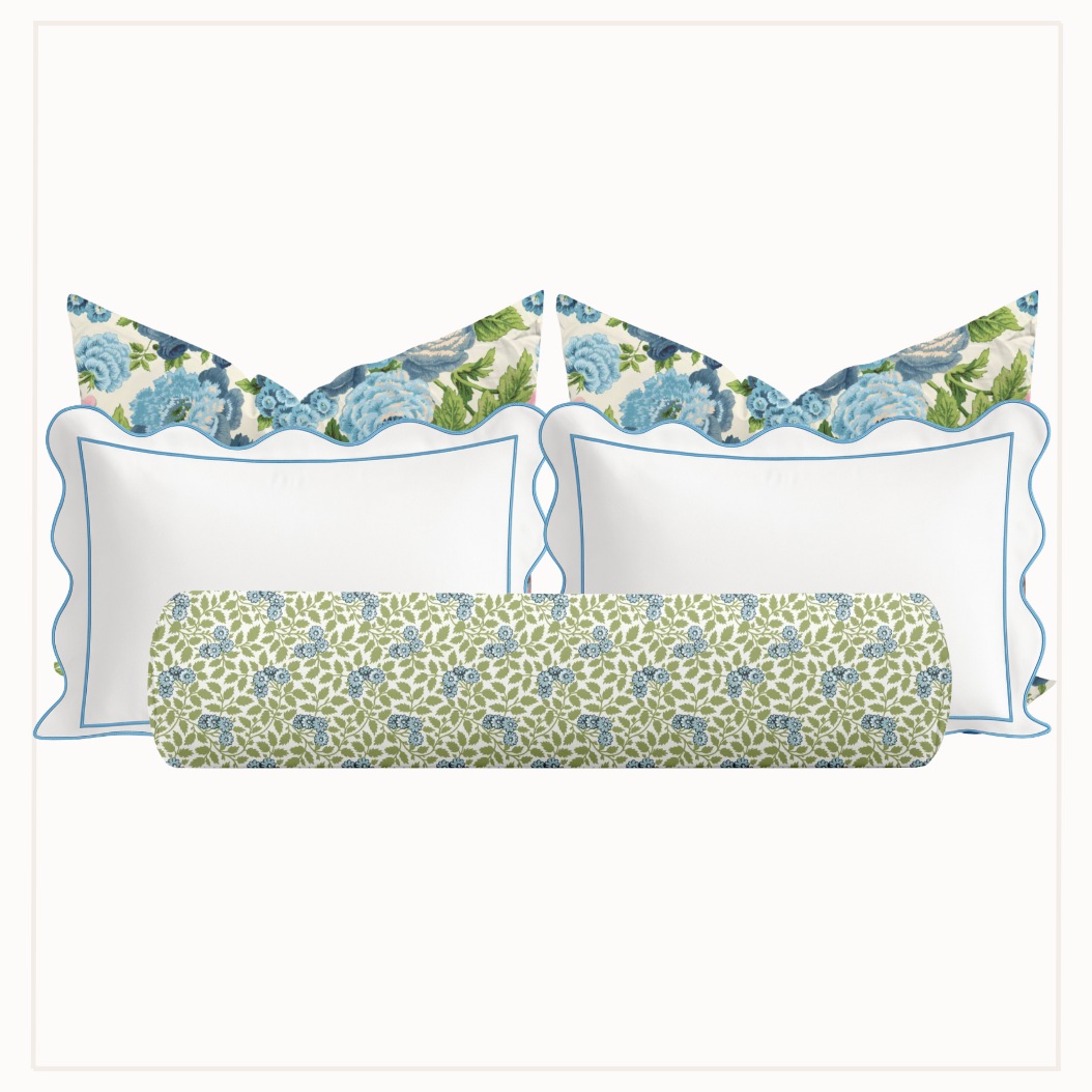 Set of decorative pillows with floral patterns on a white background