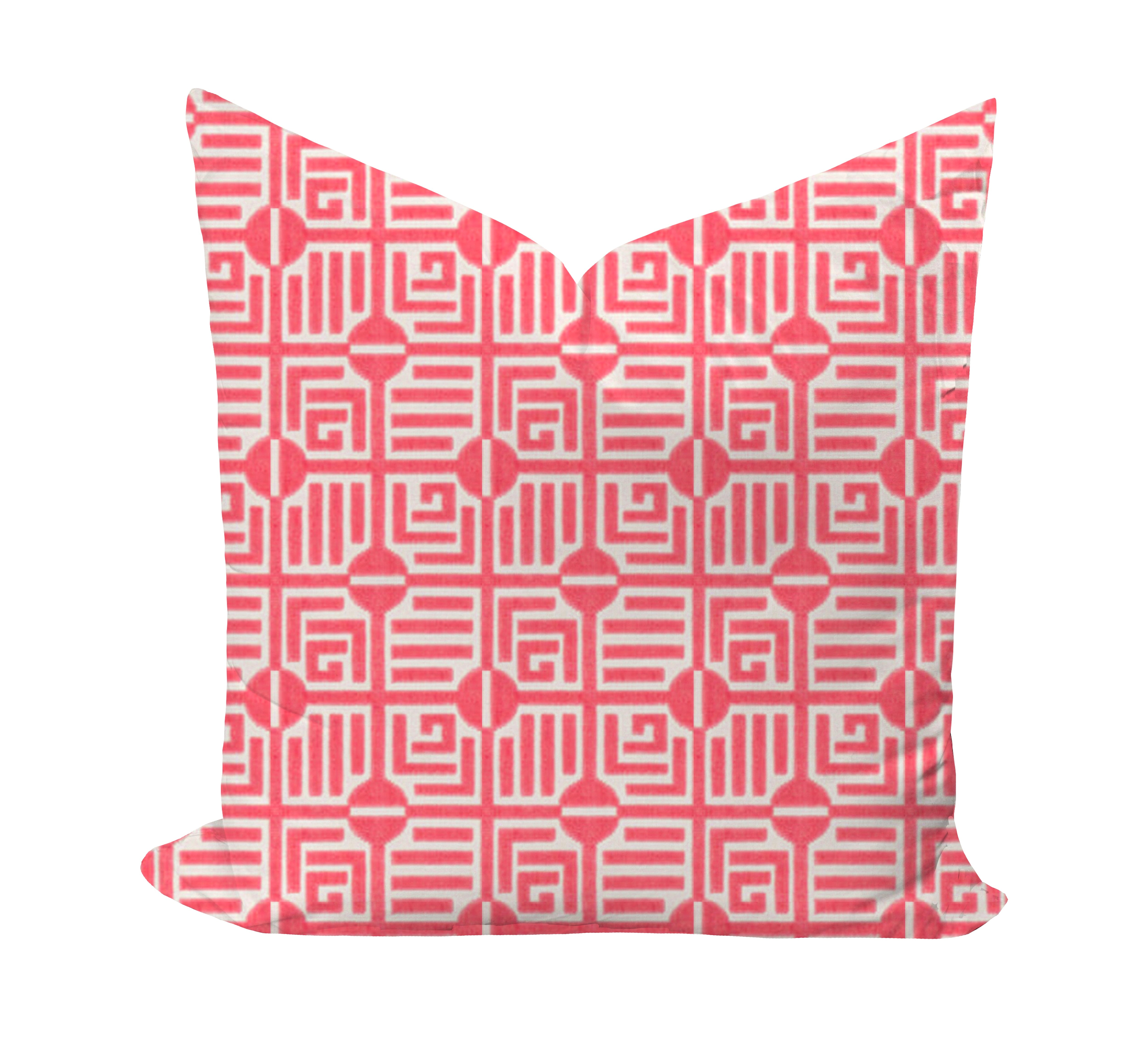 Decorative pillow with a red geometric pattern on a white background by Thibaut