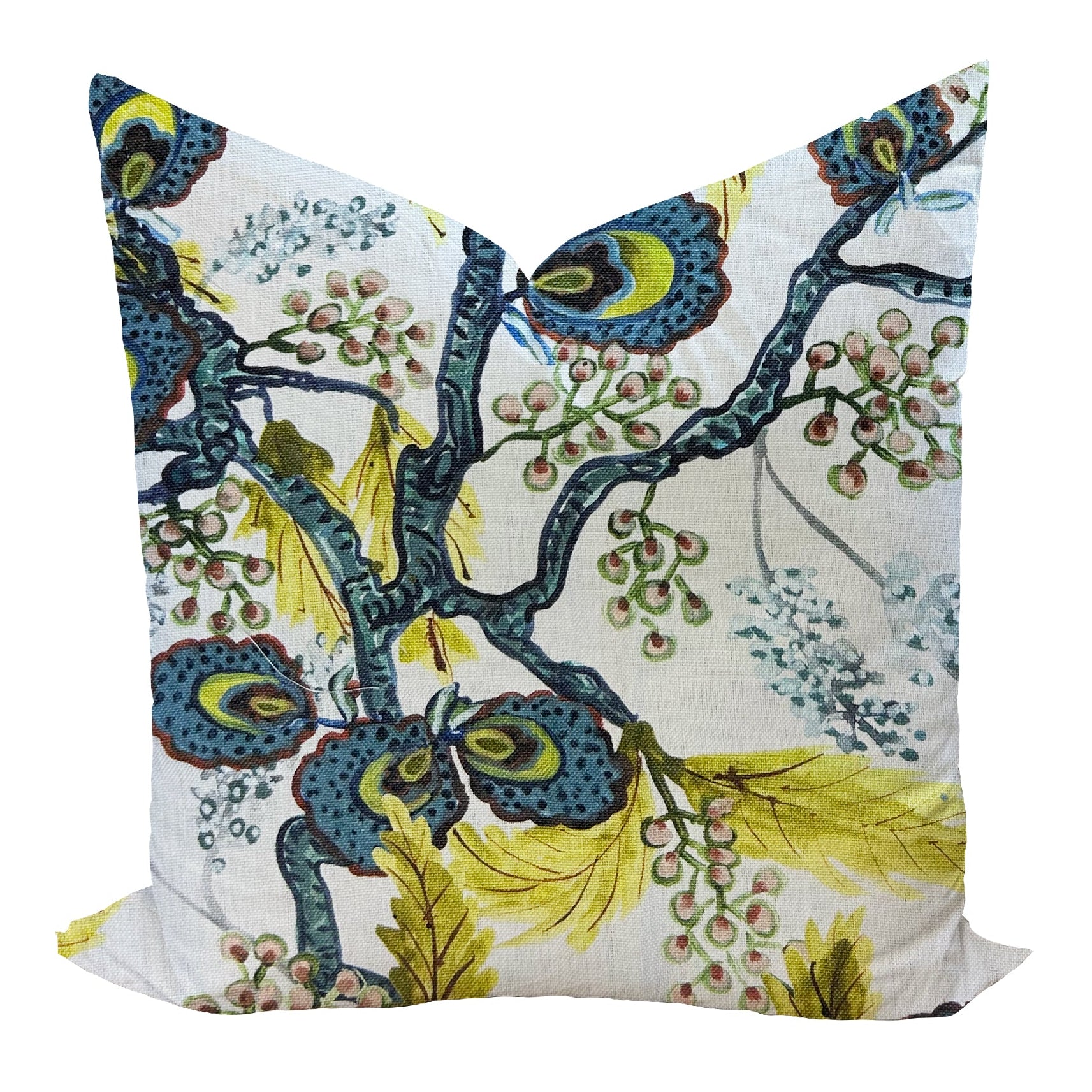 Decorative pillow with colorful nature-themed design on a white background