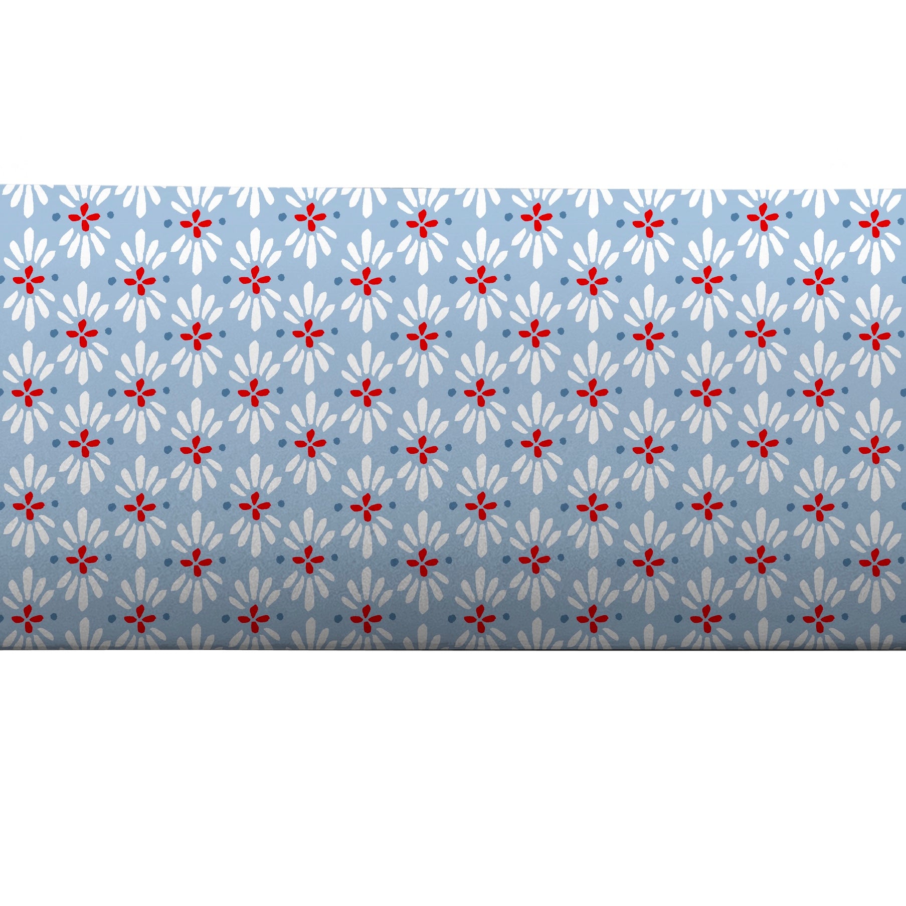 Geometric red and blue patterned bolster by Camilla Moss