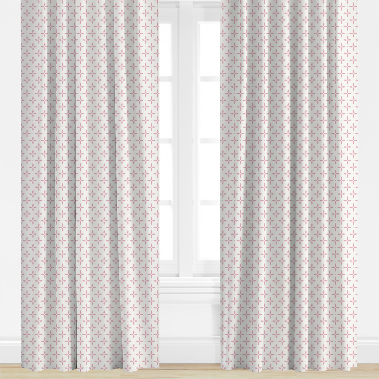 pink Patterned curtains on a window with a light background