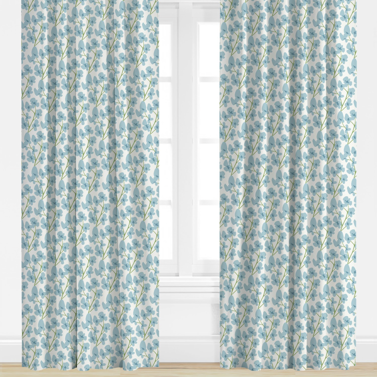 Blue Floral patterned curtains on a window with a light background