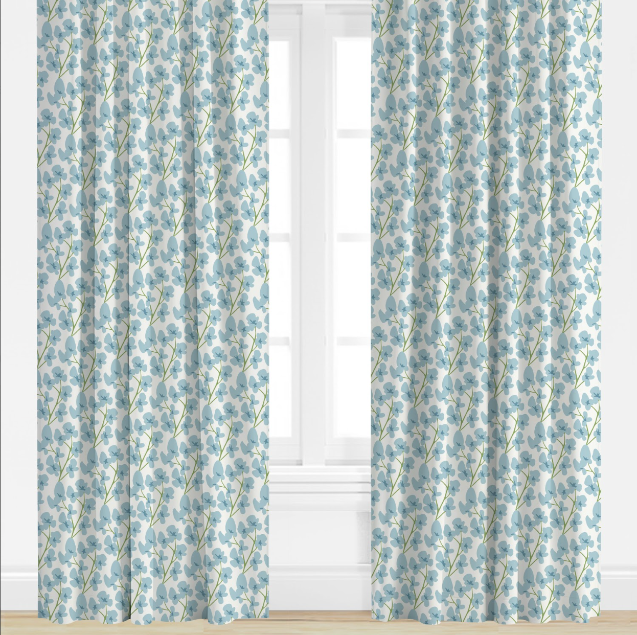 Blue Floral patterned curtains on a window with a light background