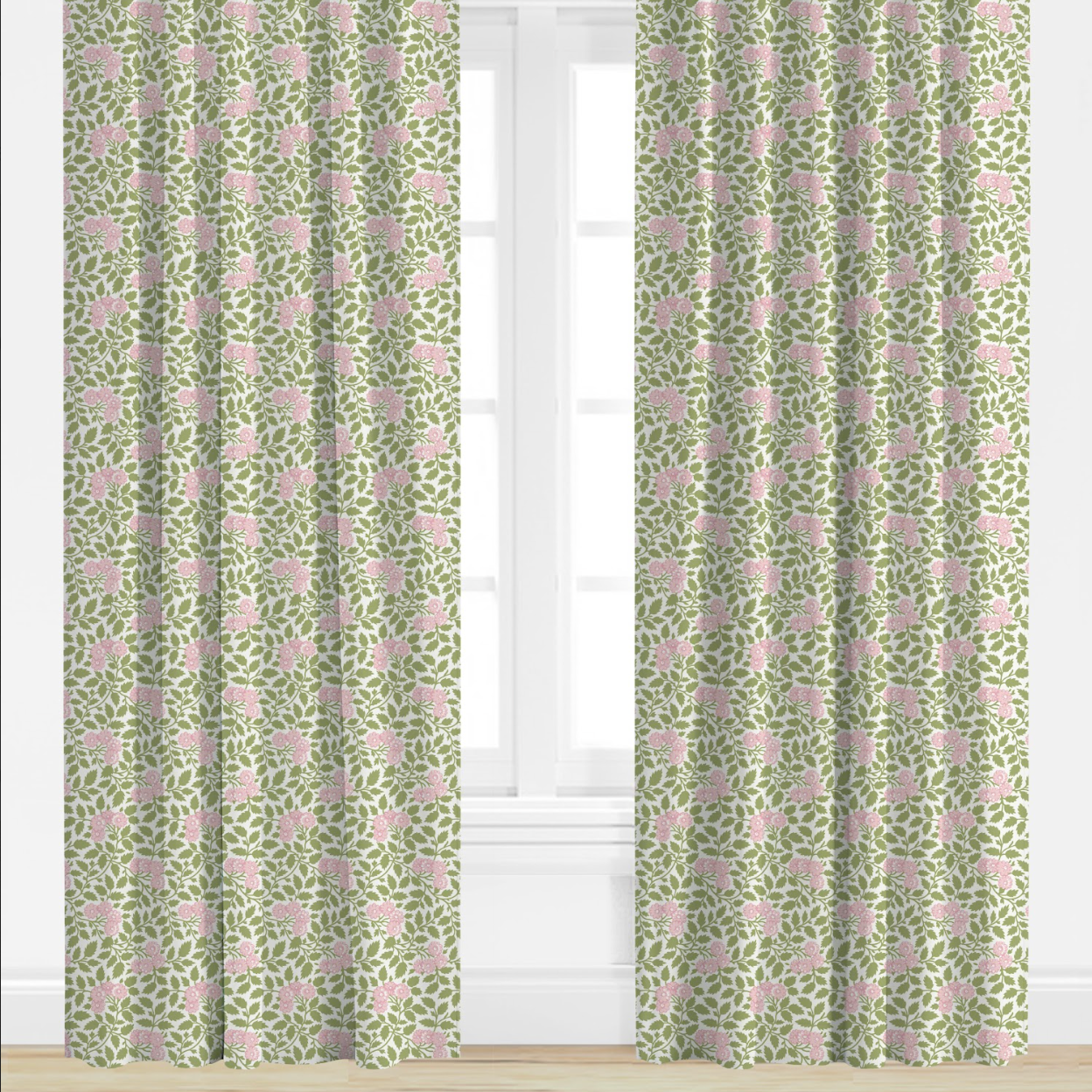 Green curtains with pink floral pattern in a room with white walls and window blinds.
