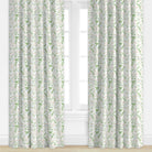 Pink and green floral patterned drapes by Camilla Moss