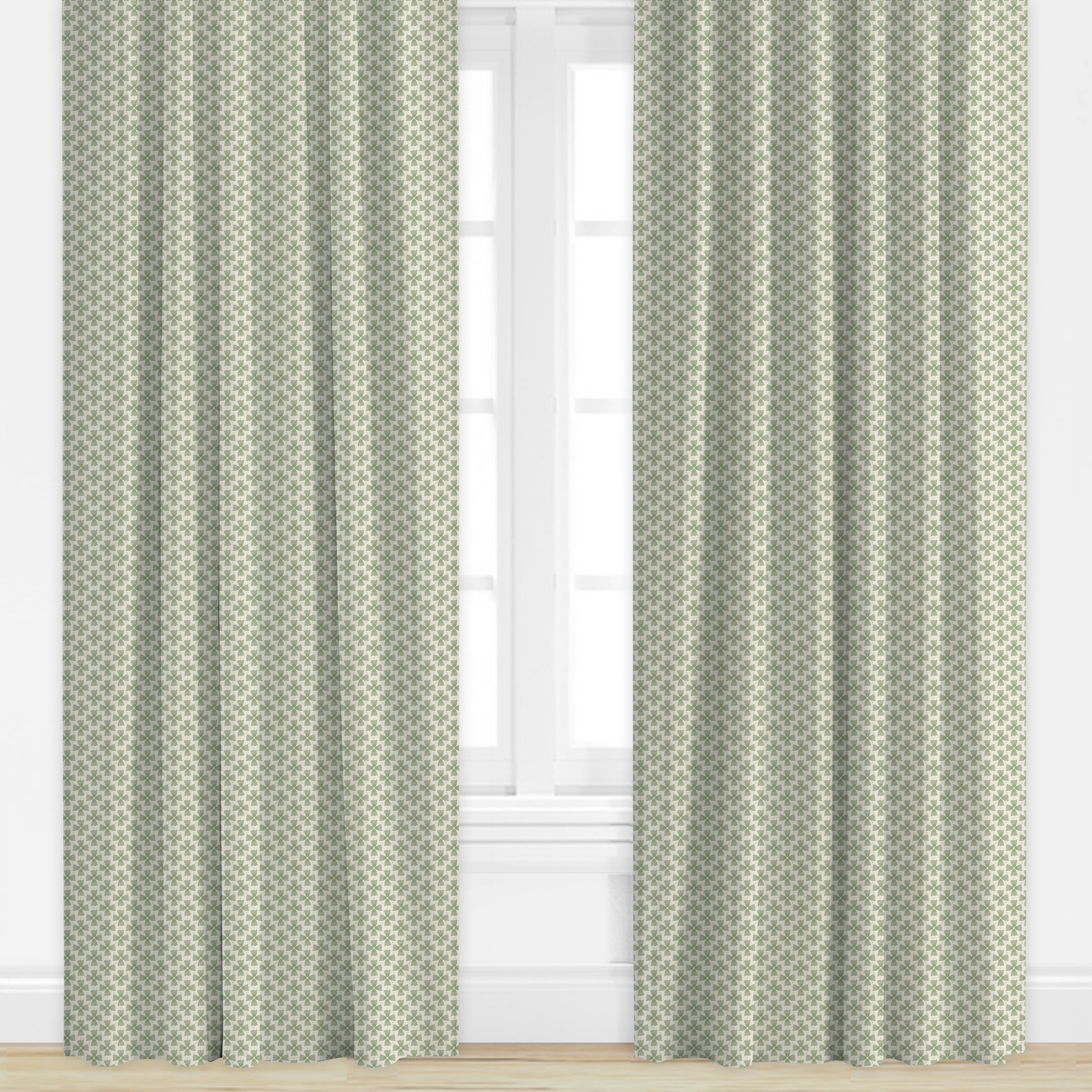 Floral patterned drape in sage green by Camilla Moss