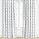 Airplane patterned drapes in blue and red by Camilla Moss