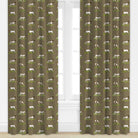 Dog patterned drape in brown by Camilla Moss