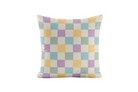 Checkered pillow with pastel colors on a white background
