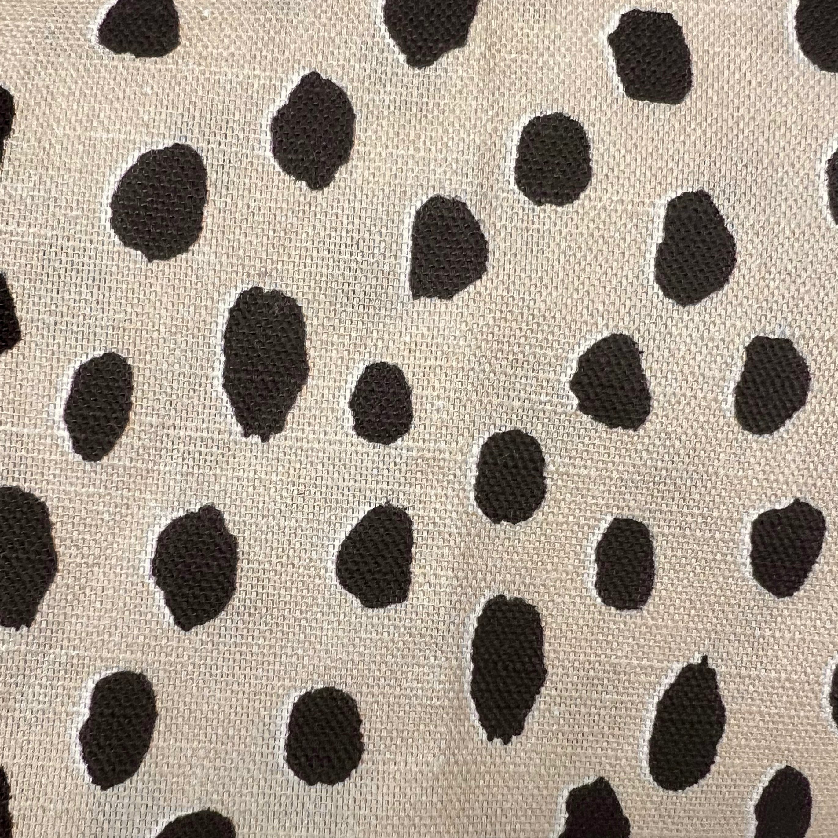 Dotted fabric in beige and black