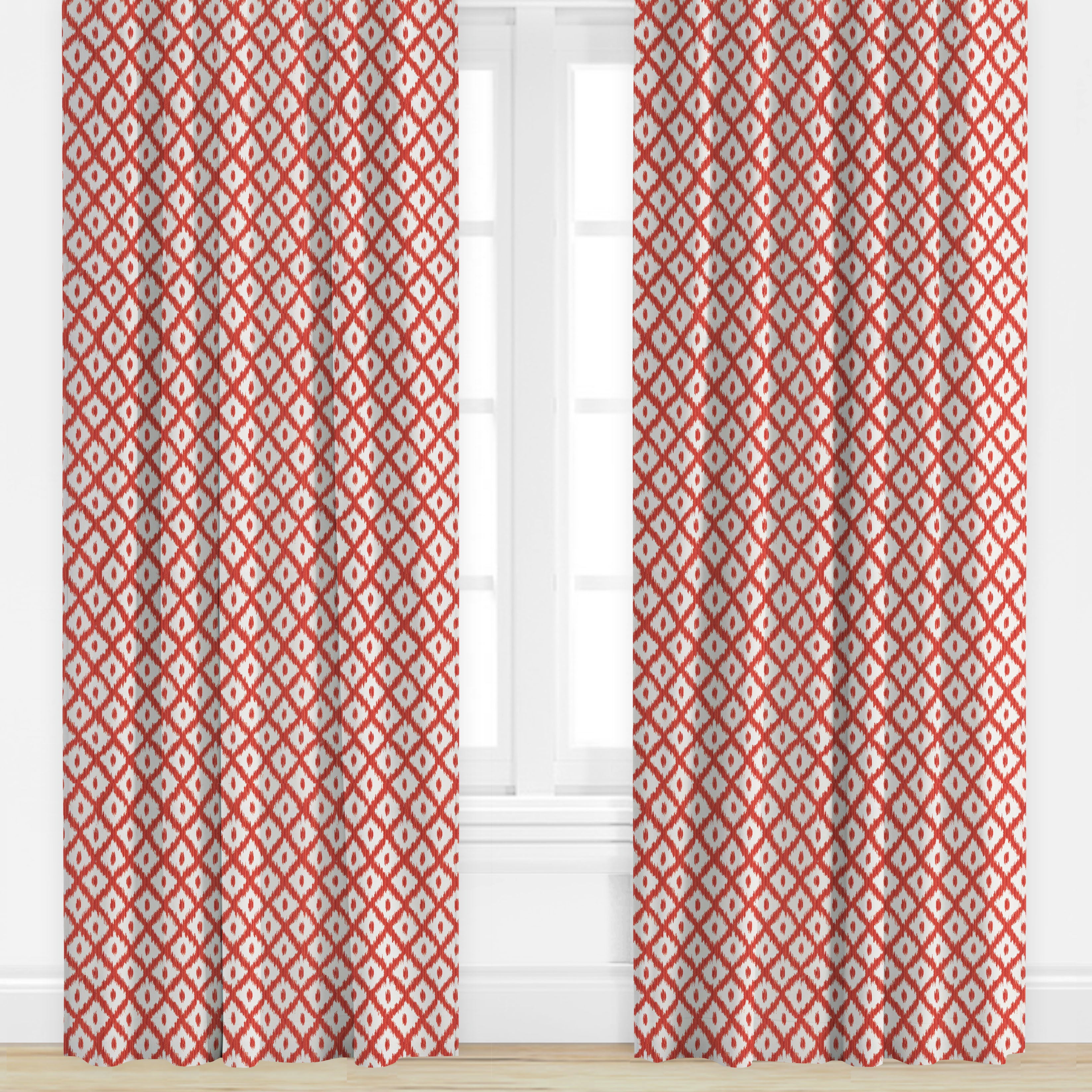 Red geometric patterned drapes by Kravet
