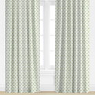 green, star Patterned curtains on a window with a light background
