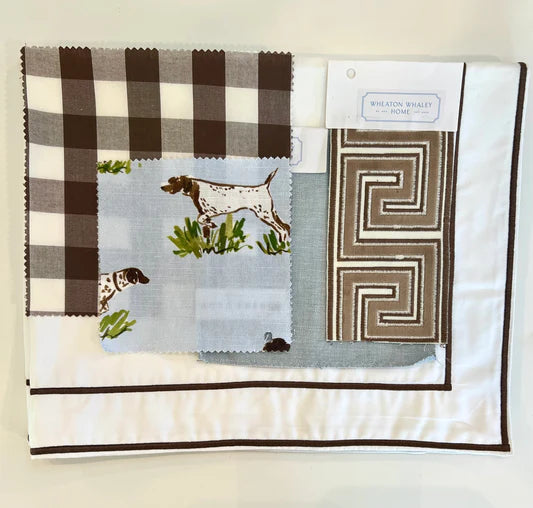 Fabric swatches with checkered pattern, hunting scene, and geometric design on a white background.