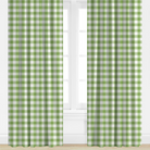 Green and white checkered curtains on a window with a white wall background