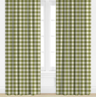 Green and white checkered curtains on a window with a white background