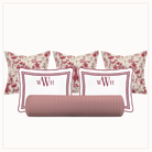 Set of pillows with floral and patterned designs on a white background