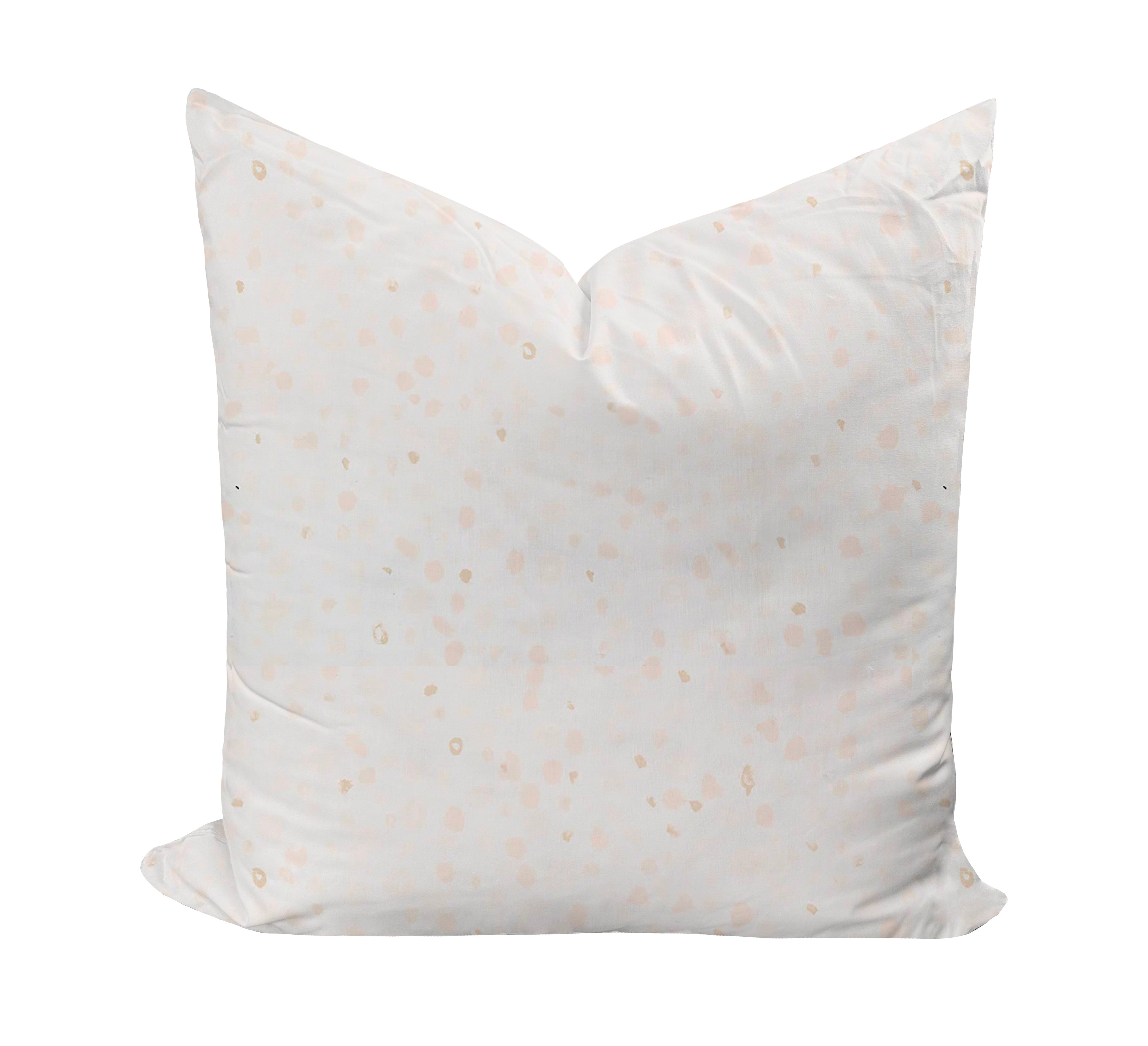 dotted throw pillow in neutral color