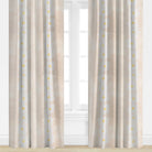 Daisy patterned drapery panel in neutral