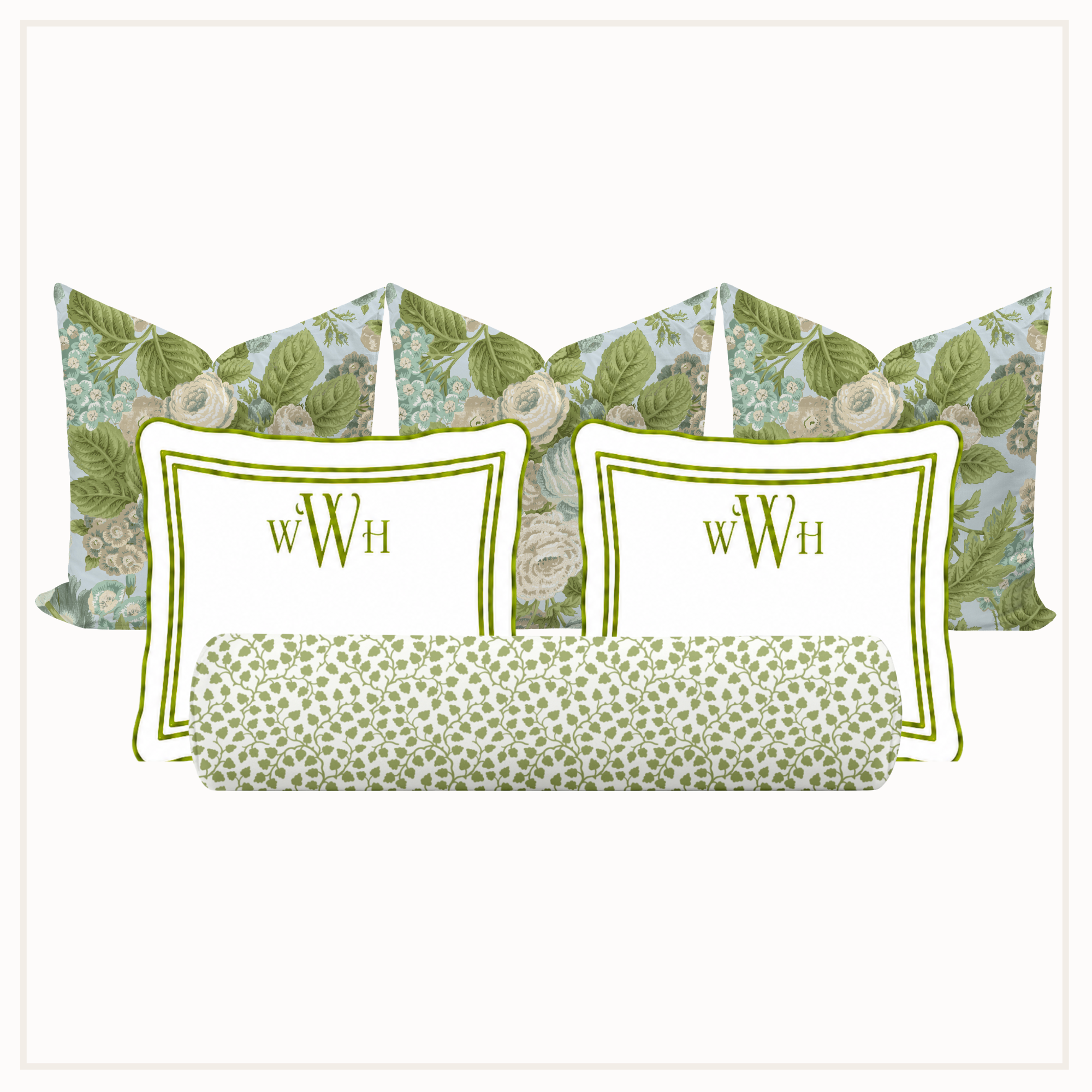 Set of decorative pillows with floral patterns and monograms on a white background