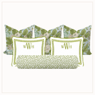 Set of decorative pillows with floral patterns and monograms on a white background