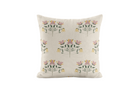 Decorative pillow with pink and green floral pattern on a white background