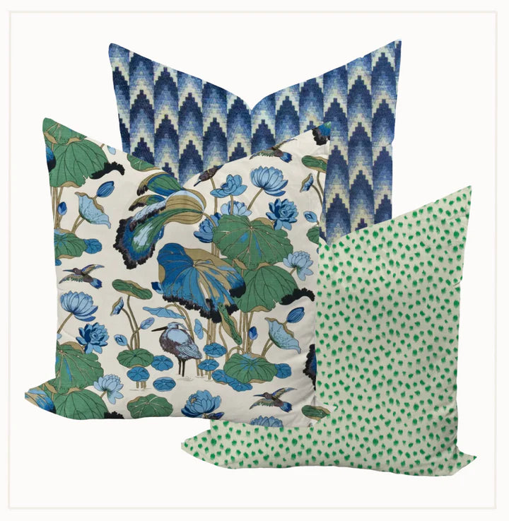 Three decorative pillows with different patterns on a white background