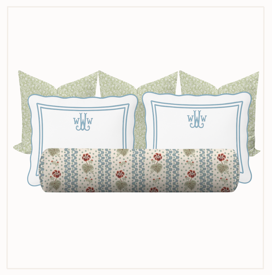 Set of pillows with monogrammed designs on a white background