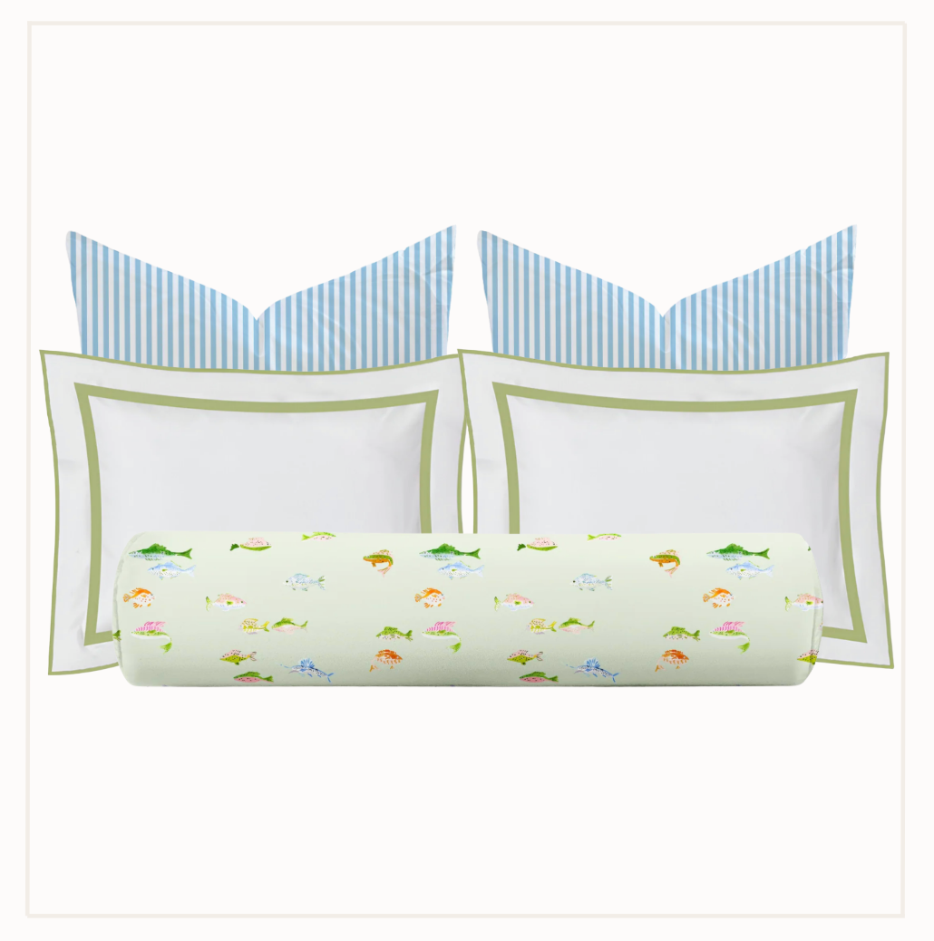Set of pillows with striped covers and a decorative cylindrical pillow on a white background