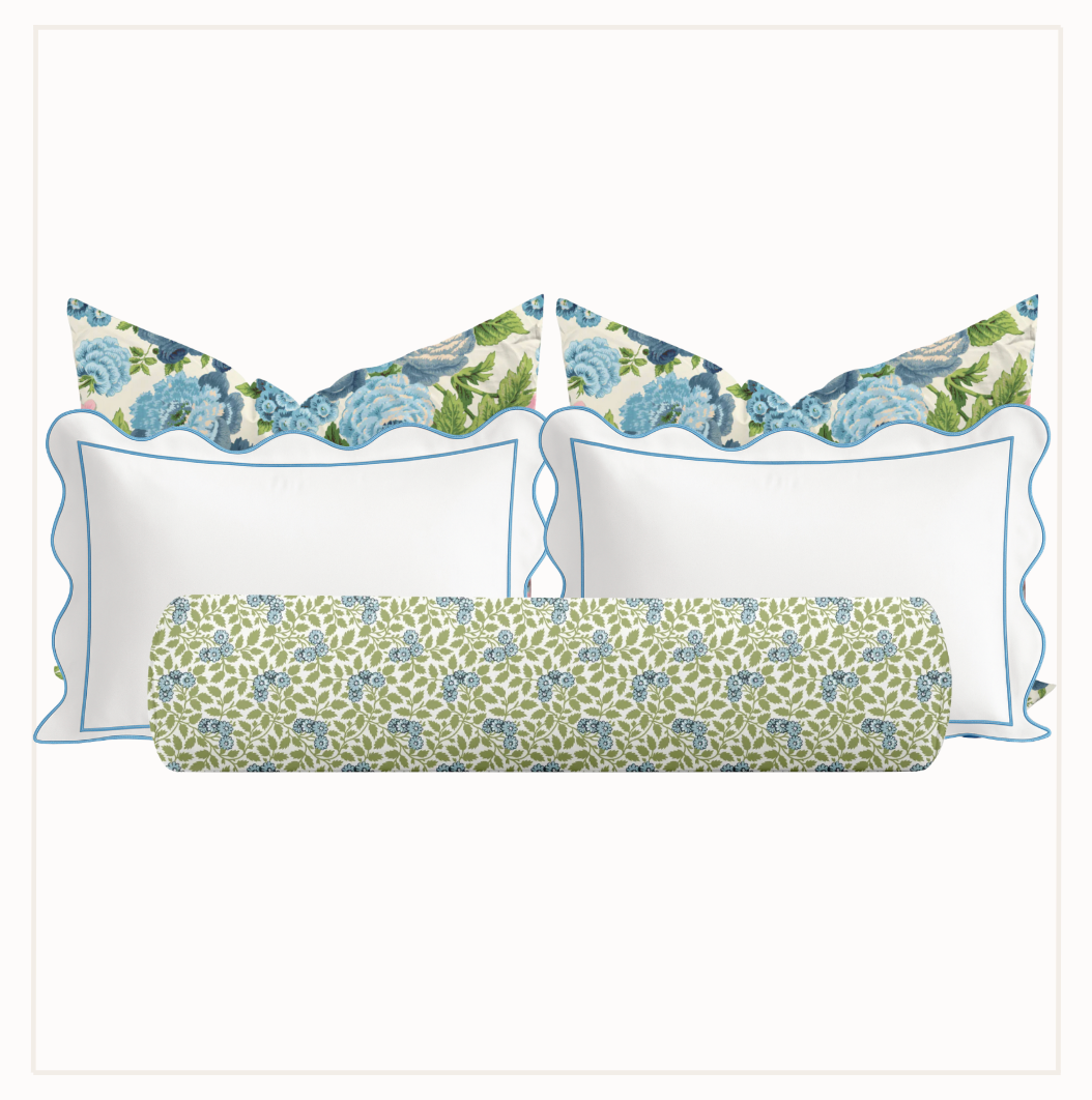 Set of decorative pillows with floral patterns on a white background