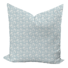 A square throw pillow with a blue  floral, geometric pattern design.