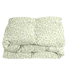 Folded floral comforter in green on a white background