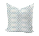 Decorative pillow with a geometric pattern in blue and purple on a white background