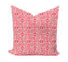 Decorative pillow with a red geometric pattern on a white background by Thibaut