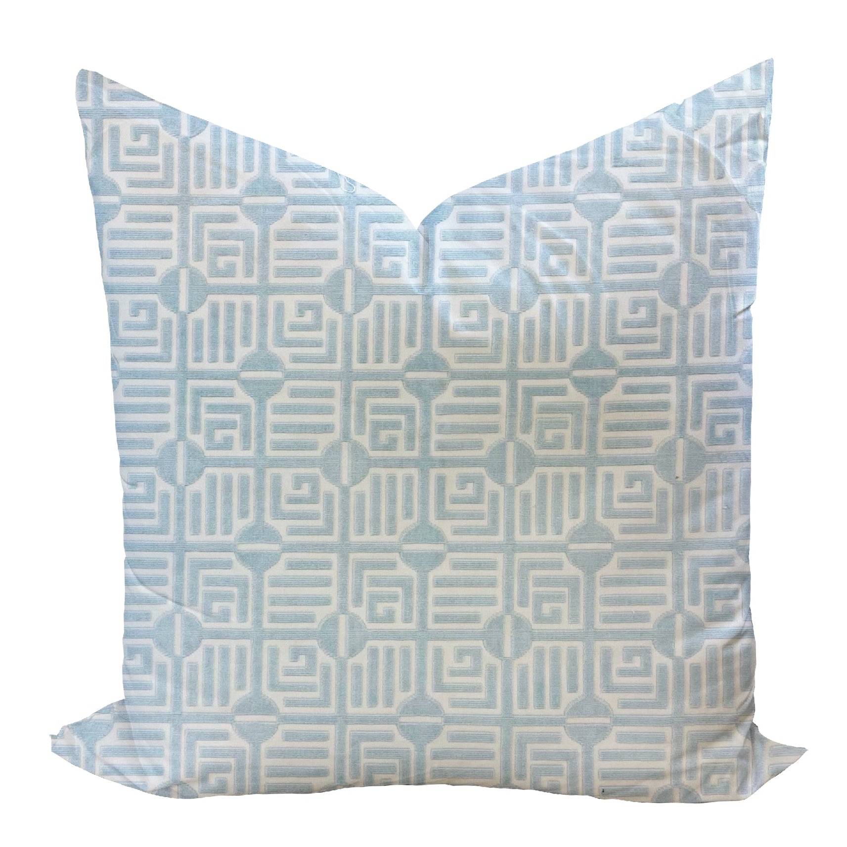 Decorative pillow with a geometric pattern on a white background