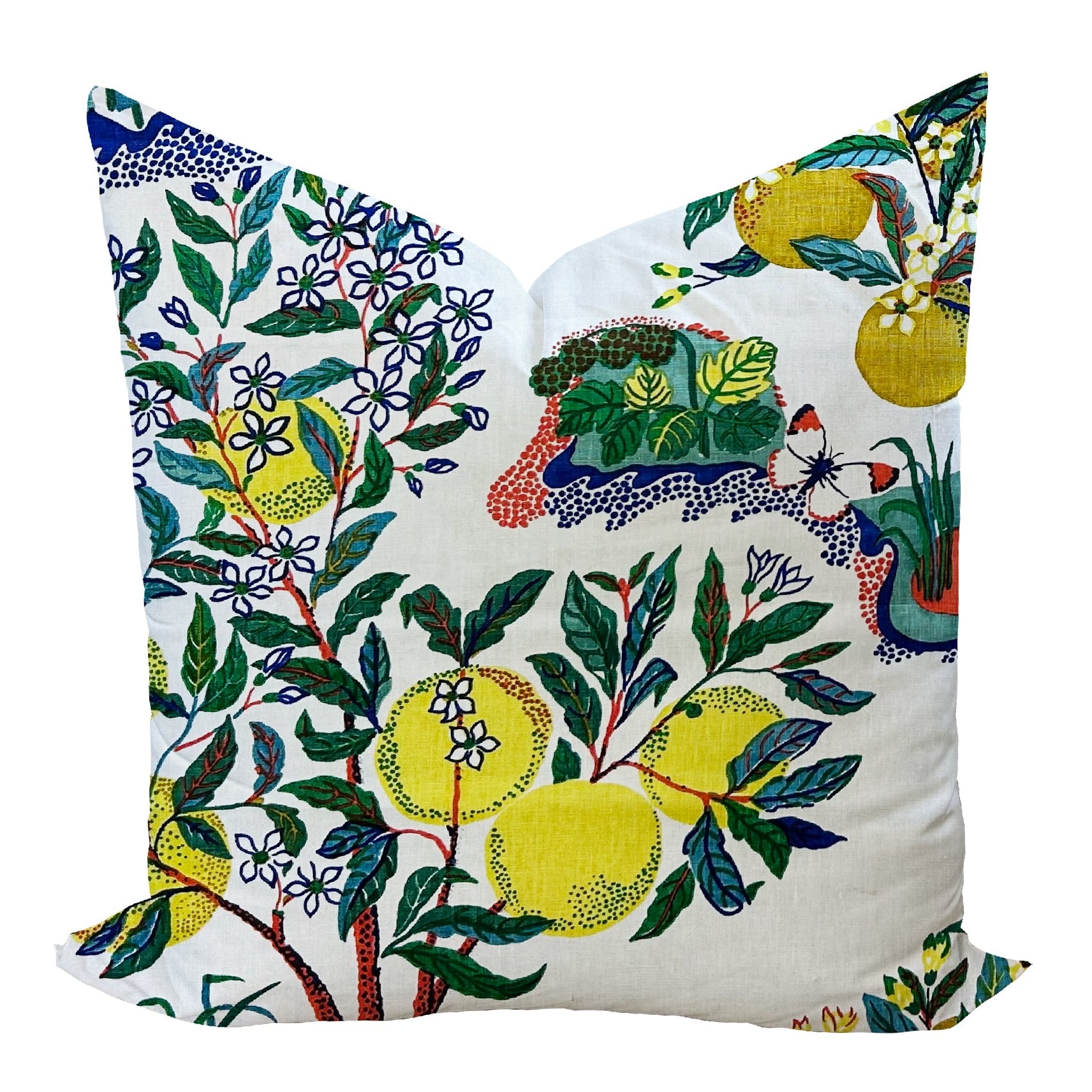 Decorative pillow with colorful floral and fruit pattern on a white background