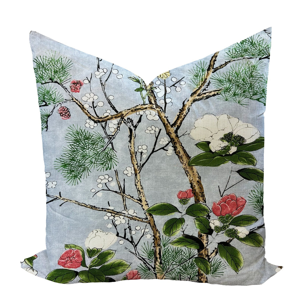 Decorative pillow with floral and branch pattern on a white background