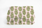 Floral and striped comforter in pink and green